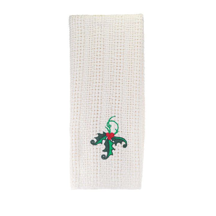 Off-white cotton kitchen towel with green-and-black fleur-de-lis embroidery