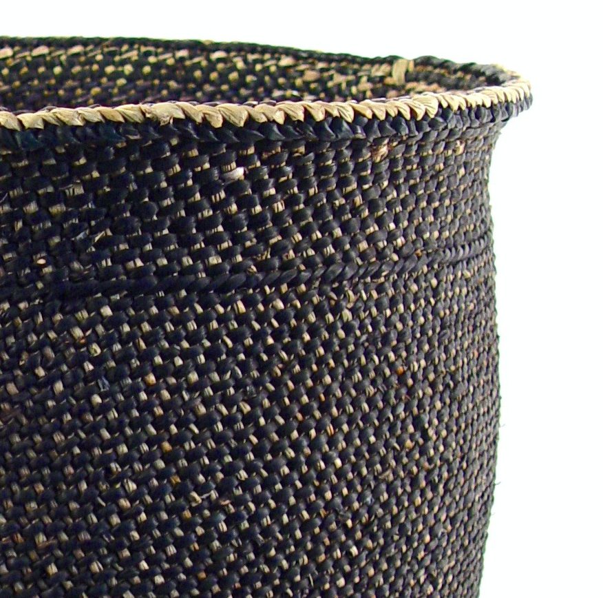 Close-up of dark woven Iringa basket weave with braided rim