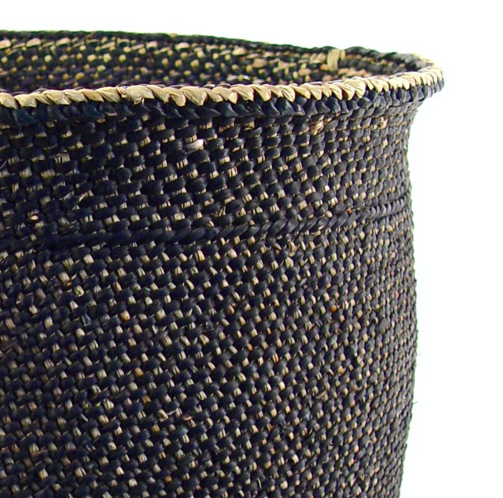 Close-up of dark woven Iringa basket weave with braided rim