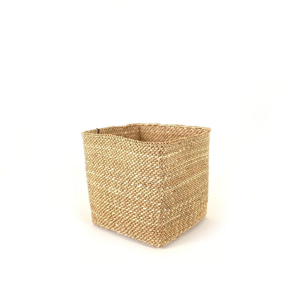 Square natural-fiber basket with open top and tight woven sides