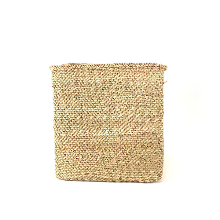 Square woven basket with open top, textured fabric pattern on front face
