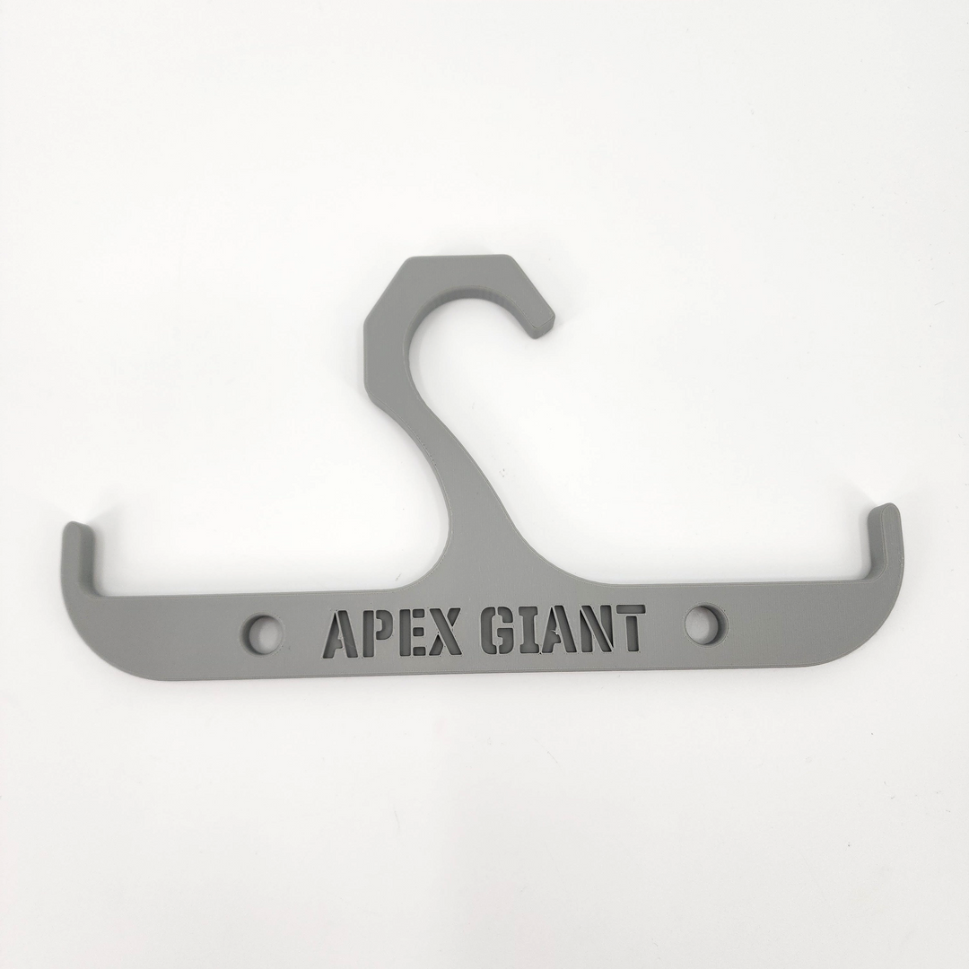 Gray backpack hanger with two curved hooks and metal mounting holes