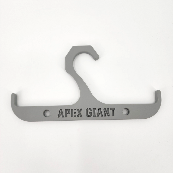 Gray backpack hanger with two curved hooks and metal mounting holes