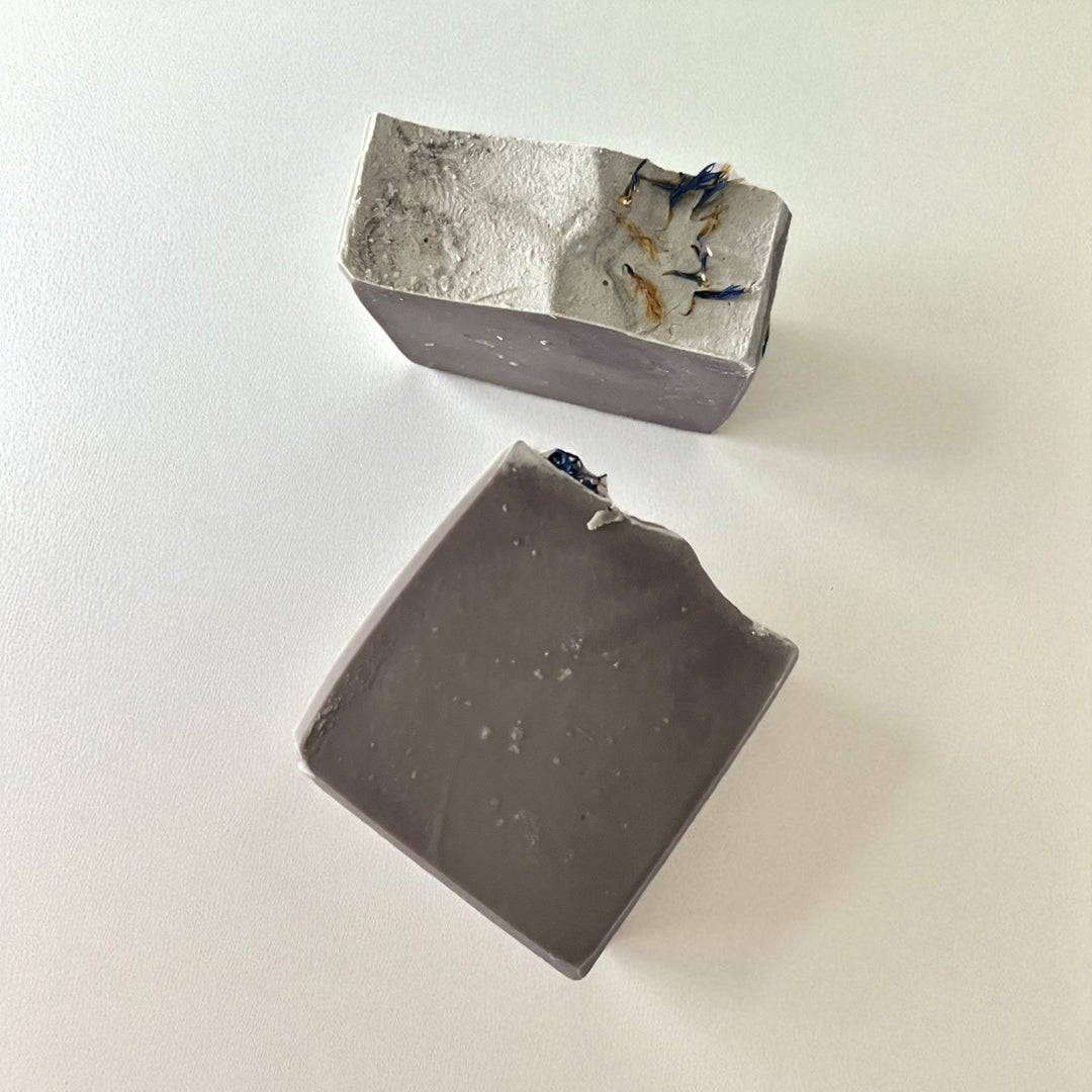 Handmade soap bars, dark gray with small blue flecks