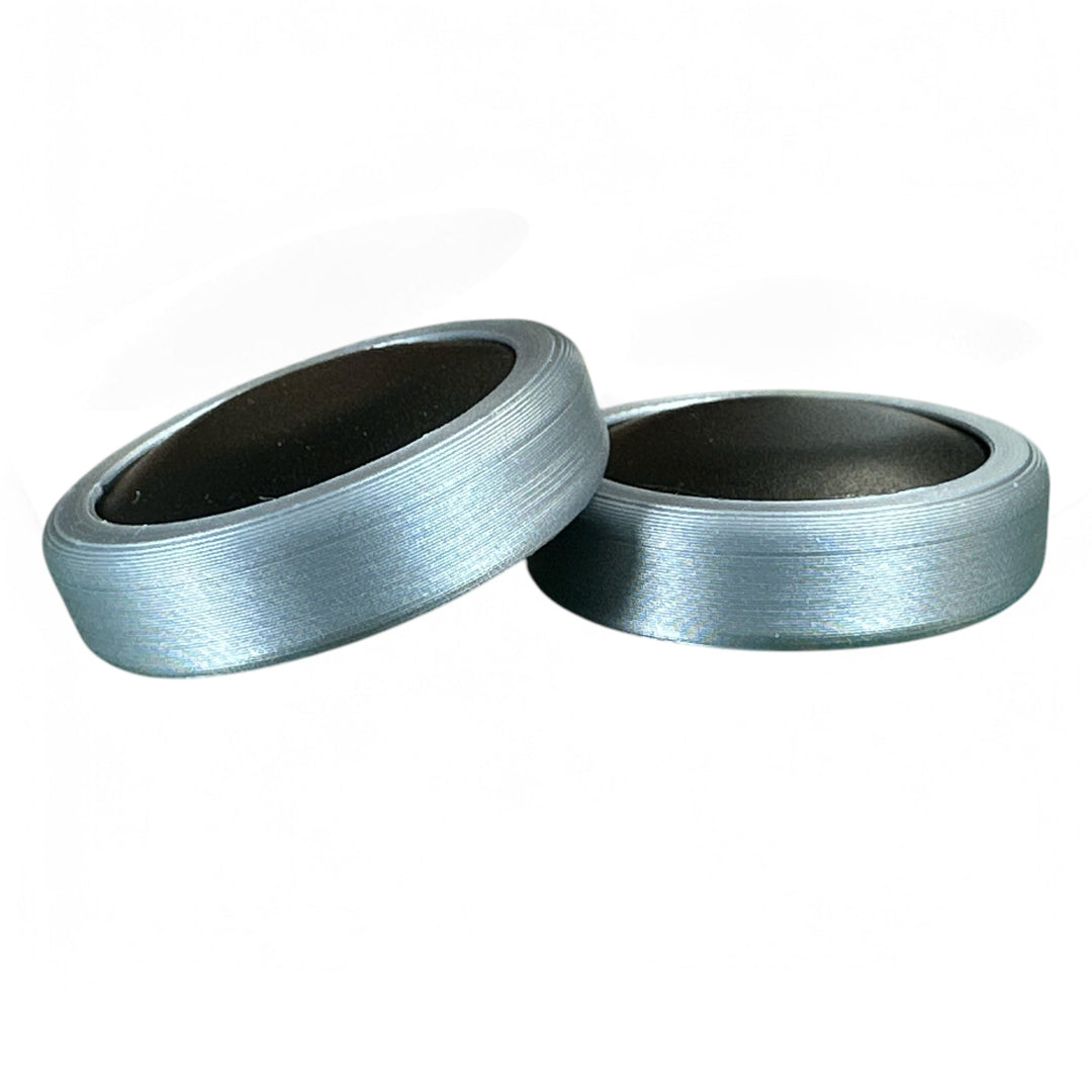 Fidget ring set, light blue metal with black inner discs