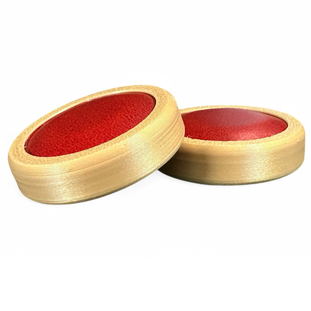 Fidget toy moon discs, red inner with gold outer, two-piece pair