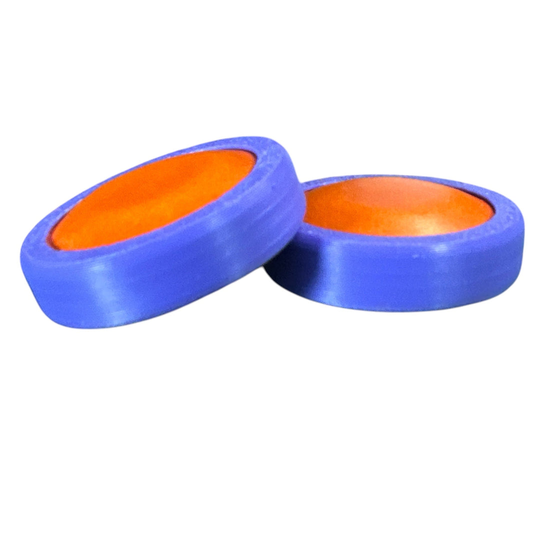 Fidget toy moon discs, orange inner with blue outer, two-piece pair
