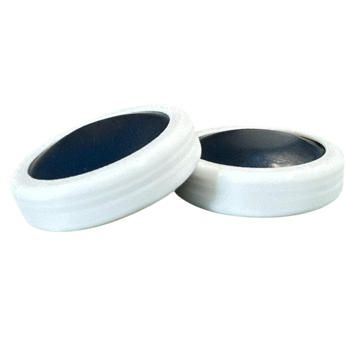 Fidget toy moon discs, black inner with white outer, two-piece pair