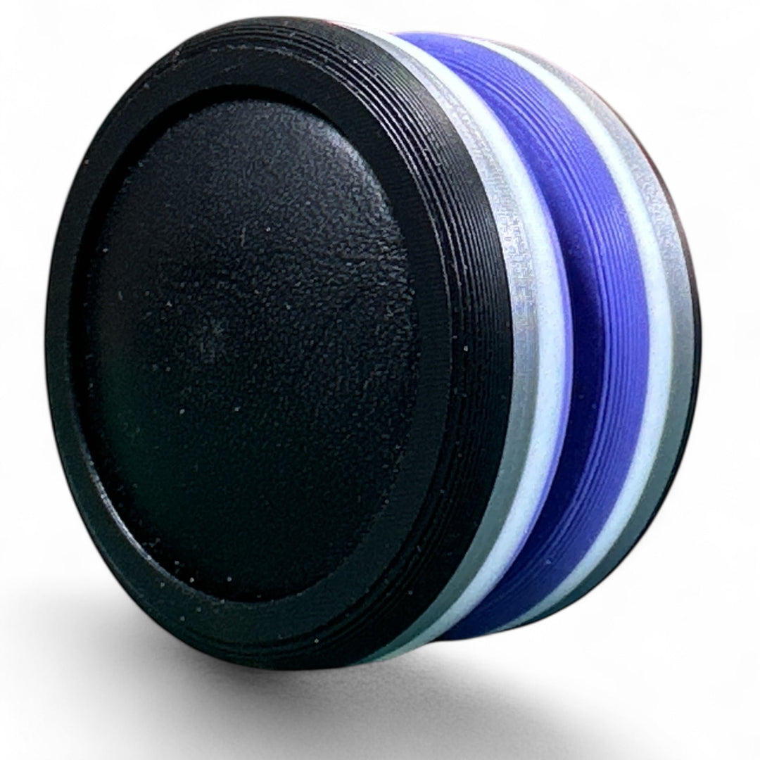 Pride Moons stack of black, white, gray, and purple oval discs