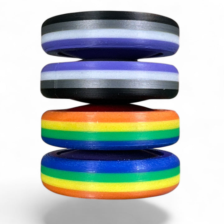 Pride Moons stack with black and purple stripes plus blue and rainbow oval discs