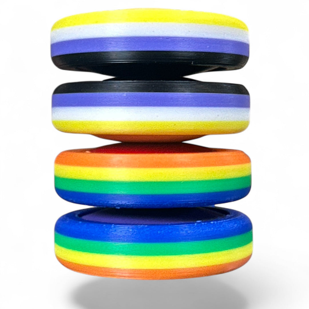 Stack of pride rainbow striped round bands in yellow, purple, orange, green, and blue