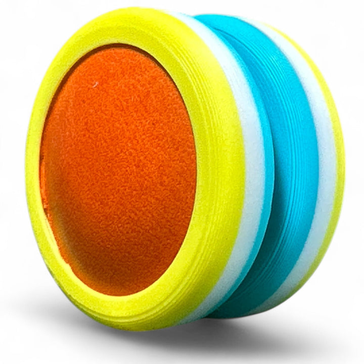 Rainbow pride ring with yellow and blue stripes, orange inner oval.
