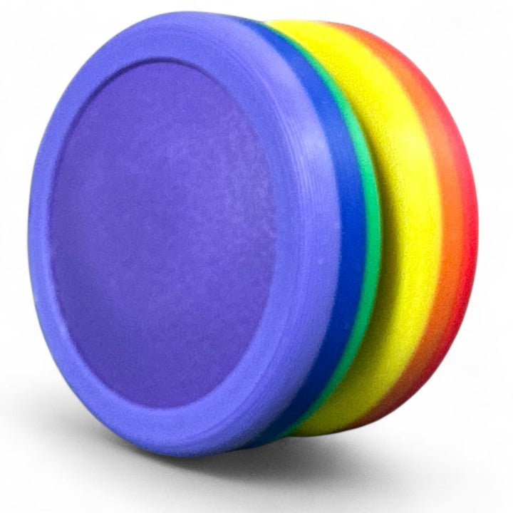 Rainbow pride ring with purple and yellow bands and smooth purple inner face.