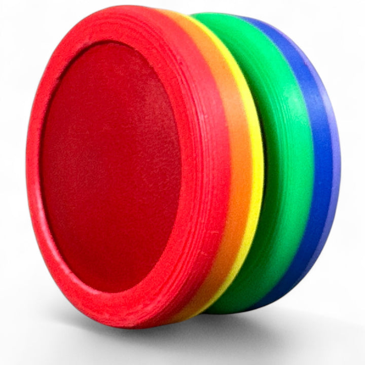 Multicolor fidget rings: red, yellow, green, and blue striped discs