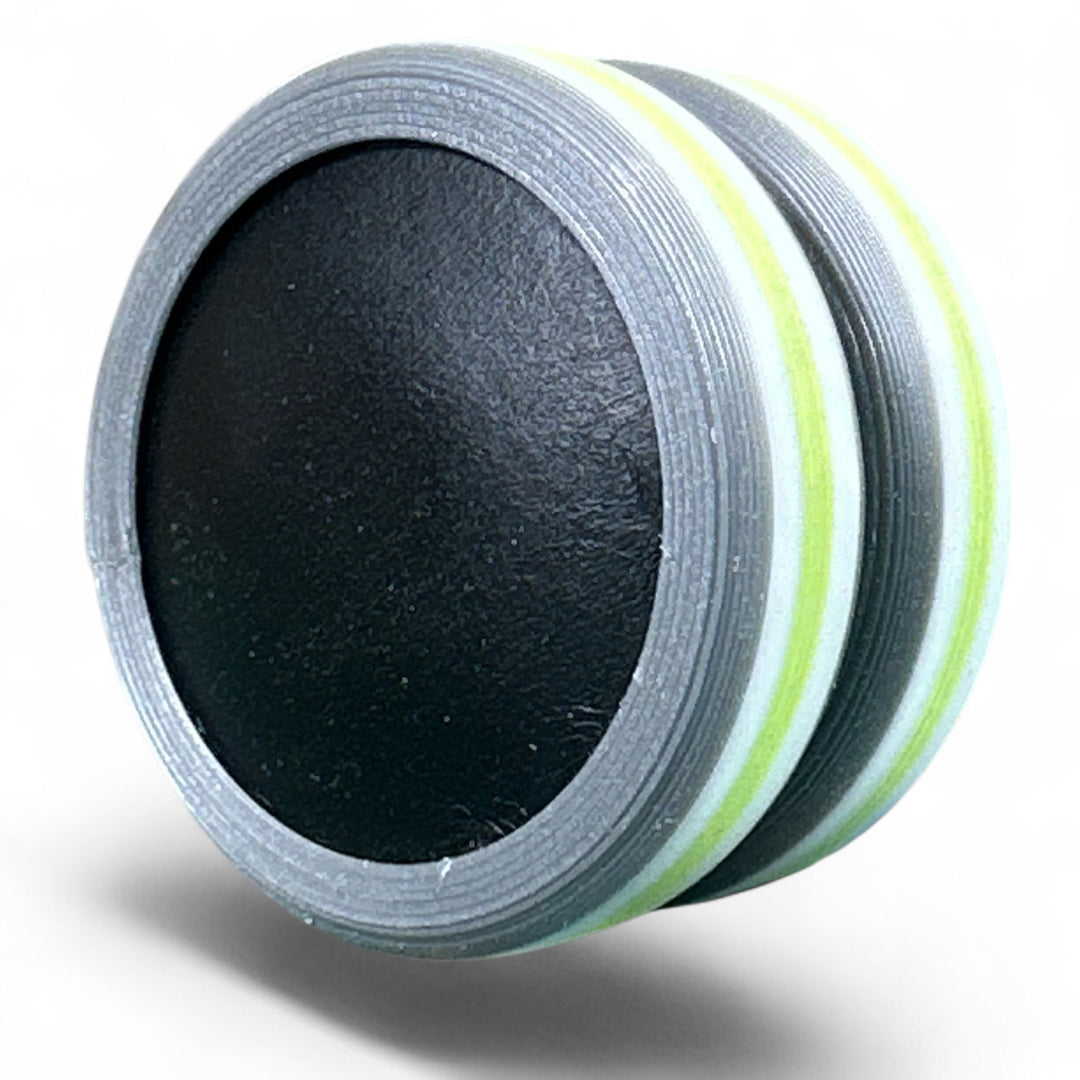 Pride Moons circular discs with light gray outer ring, black center window