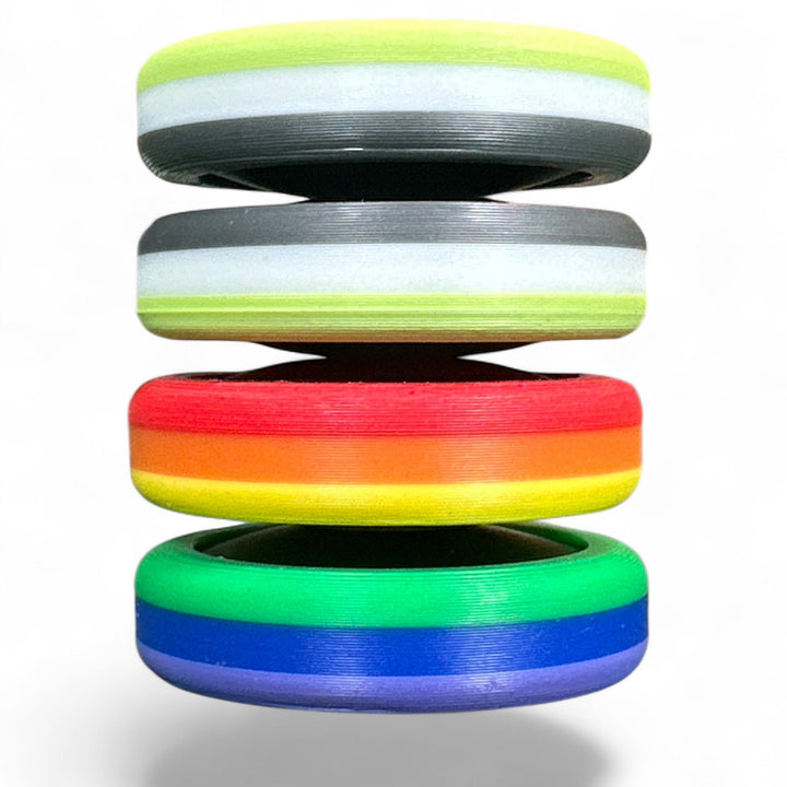 Pride Moons stacked colored disc bands in lime, teal, red, orange, blue, and green stripes