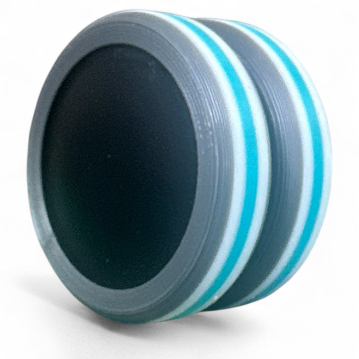 Pride Moons stacked disc bands in light gray, bright blue, and dark black center