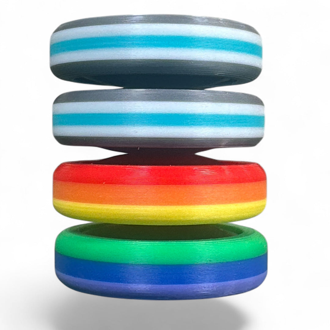 Pride Moons stacked disc bands in light blue, red, orange, yellow, green, and purple stripes