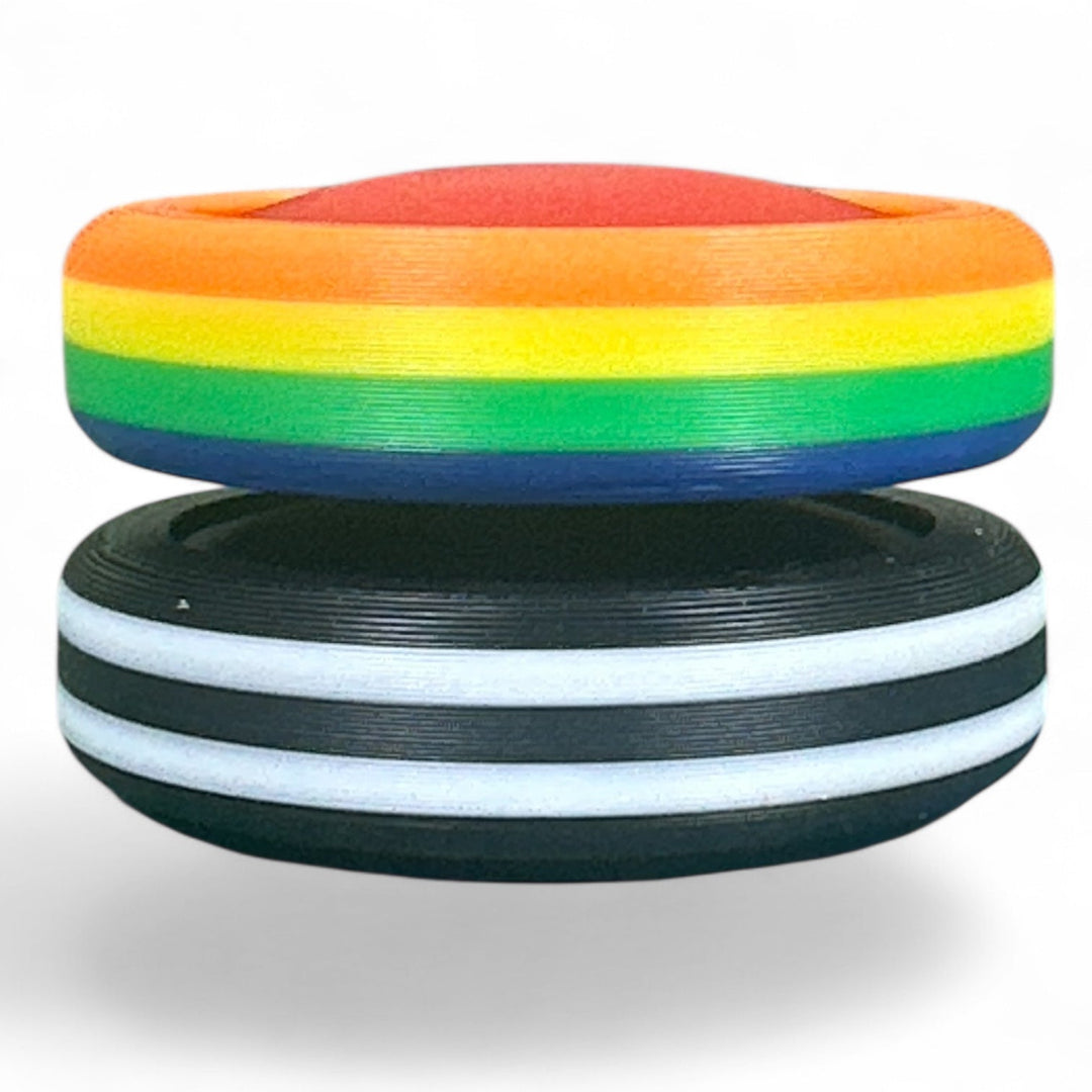 Pride Moons stacked disc bands with rainbow top, black middle, and white stripe bottom