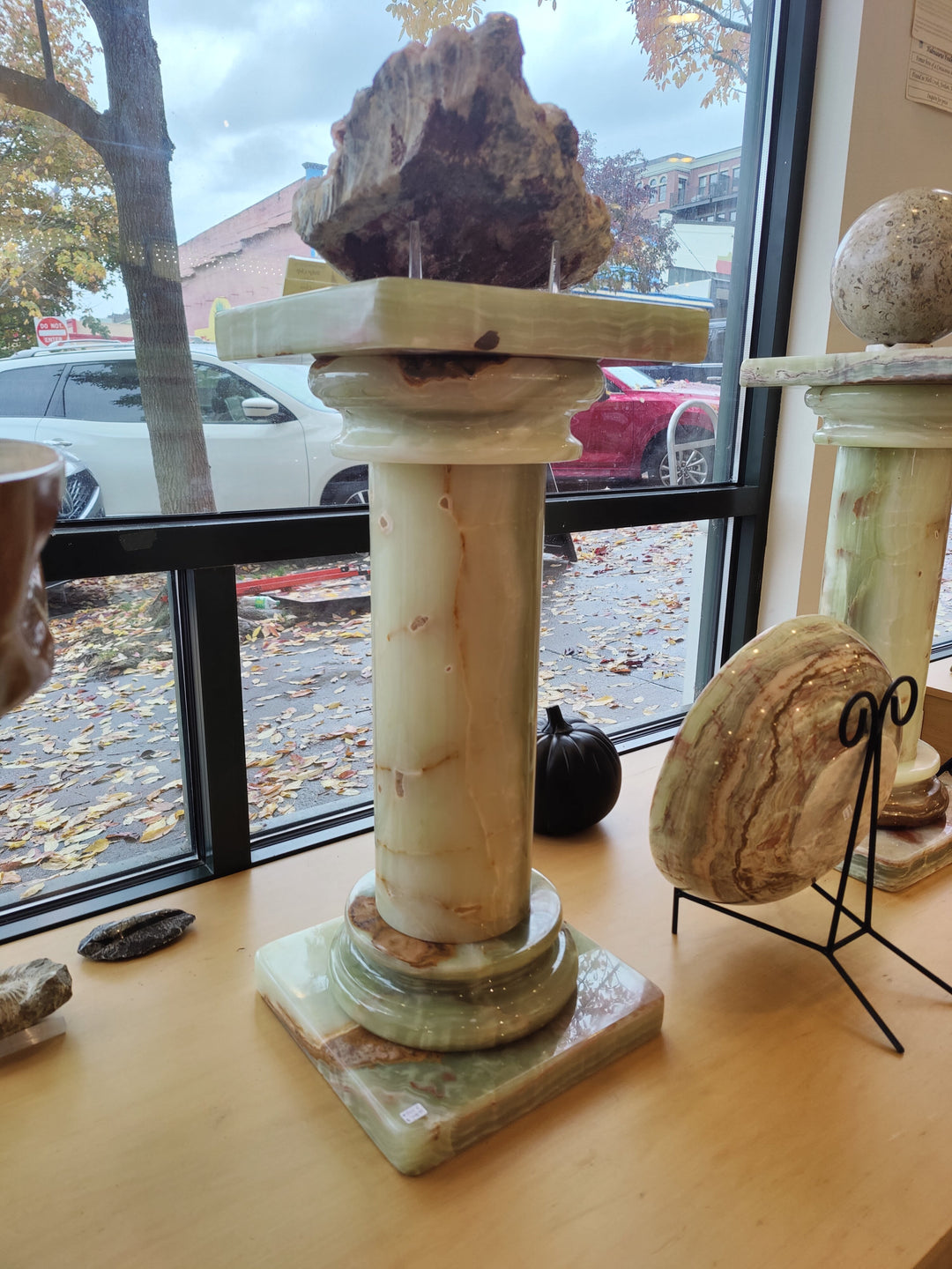 Decorative stone pillar column with rounded base and top, light beige color, 27 in