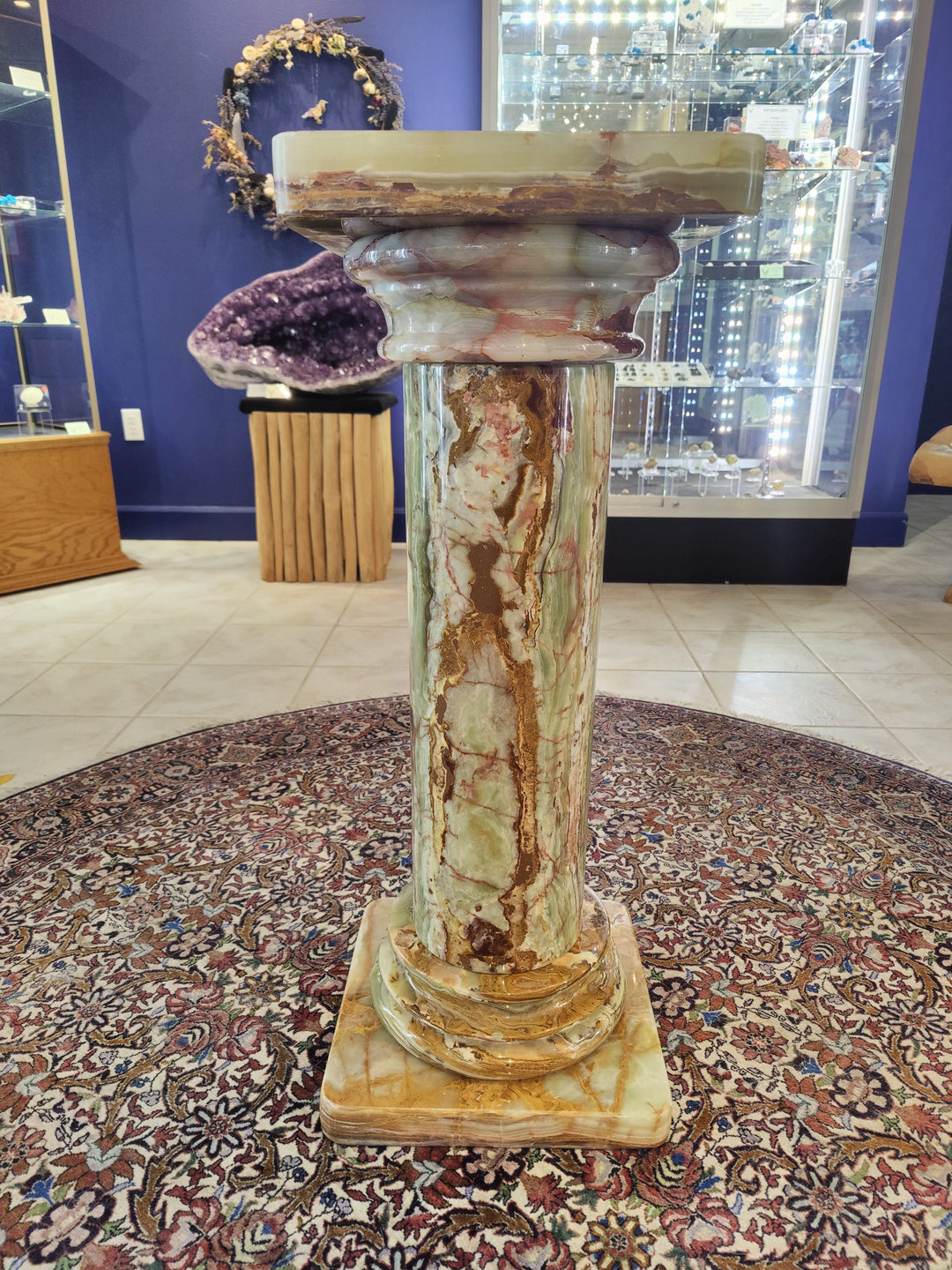Green onyx decorative pillar column with fluted body and rounded tiered top