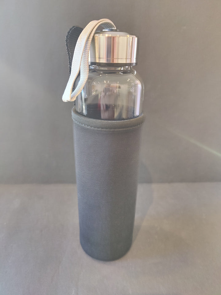 Glass water bottle with stainless steel cap, gray insulation sleeve, rope handle