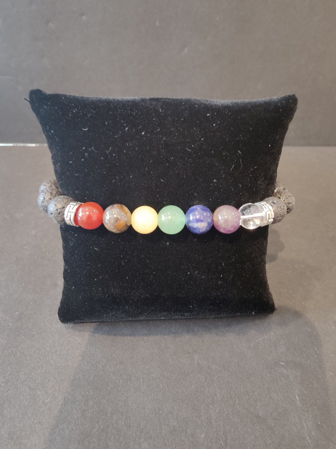 Beaded stone bracelet with multicolor round beads and silver spacer beads