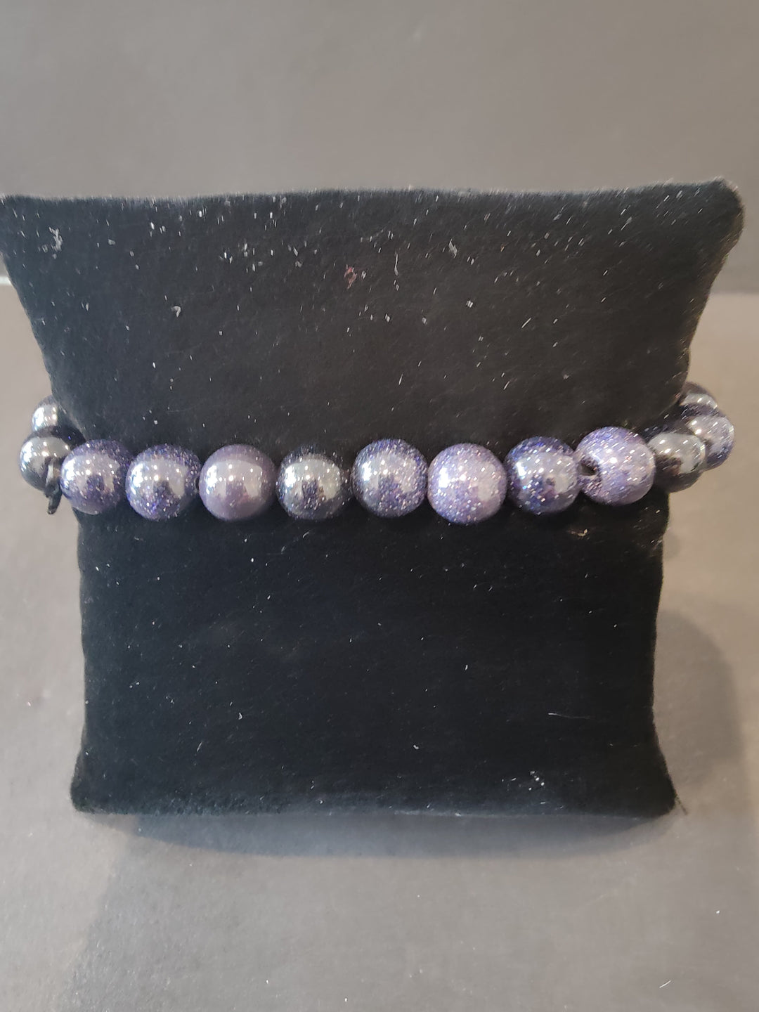 8mm beaded bracelet with purple speckled stone beads