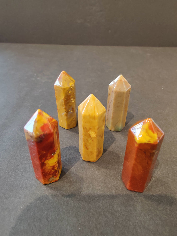 Golden yellow and amber crystal tower sculpture set with faceted tops