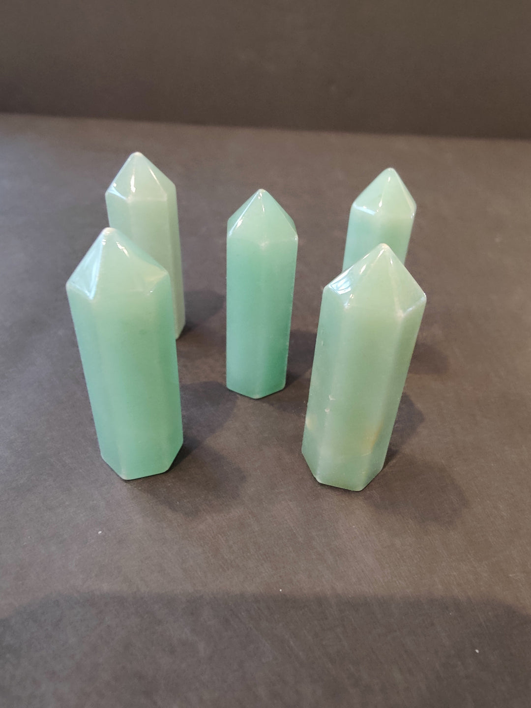 Light mint green crystal tower sculpture set with faceted tops
