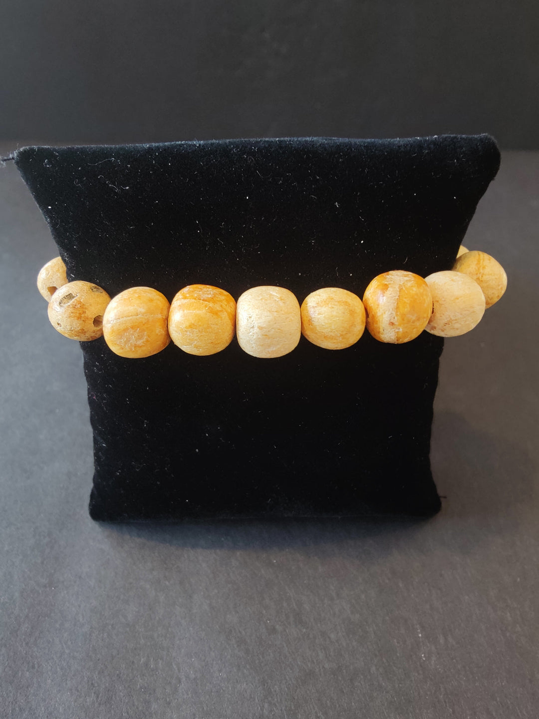 Tan wood beaded bracelet with round 8mm beads, stretchy string closure