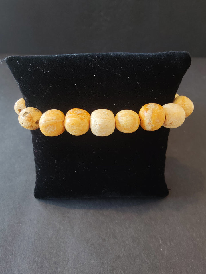 Tan wood beaded bracelet with round 8mm beads, stretchy string closure