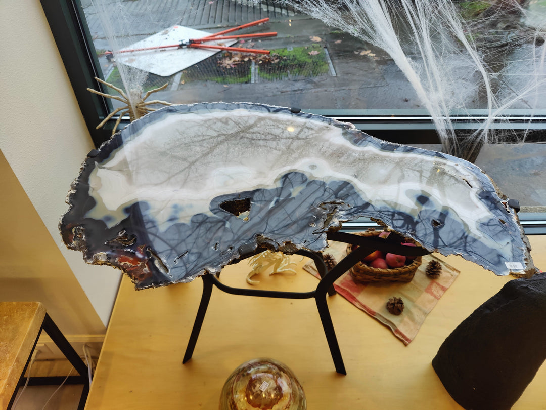 Agate slab end table with wide blue-gray agate slab top and black metal legs