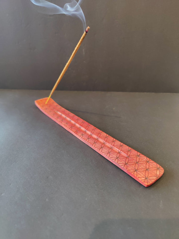 Red wood incense burner with geometric print, long flat tray with smoking incense
