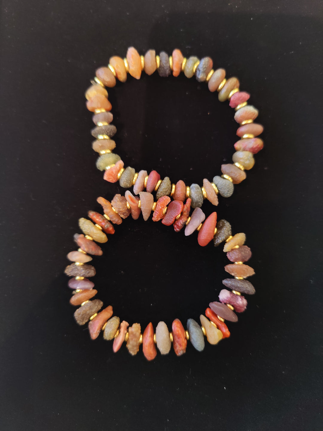 Gold and multicolor beaded agate bracelet with small faceted stone beads