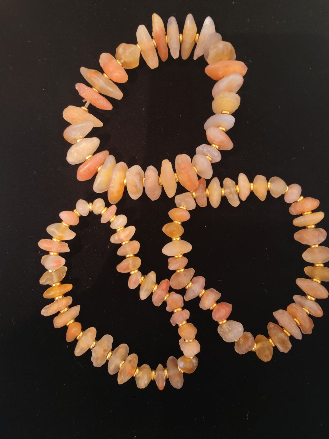 Peach and orange beaded agate bracelet with smooth teardrop beads