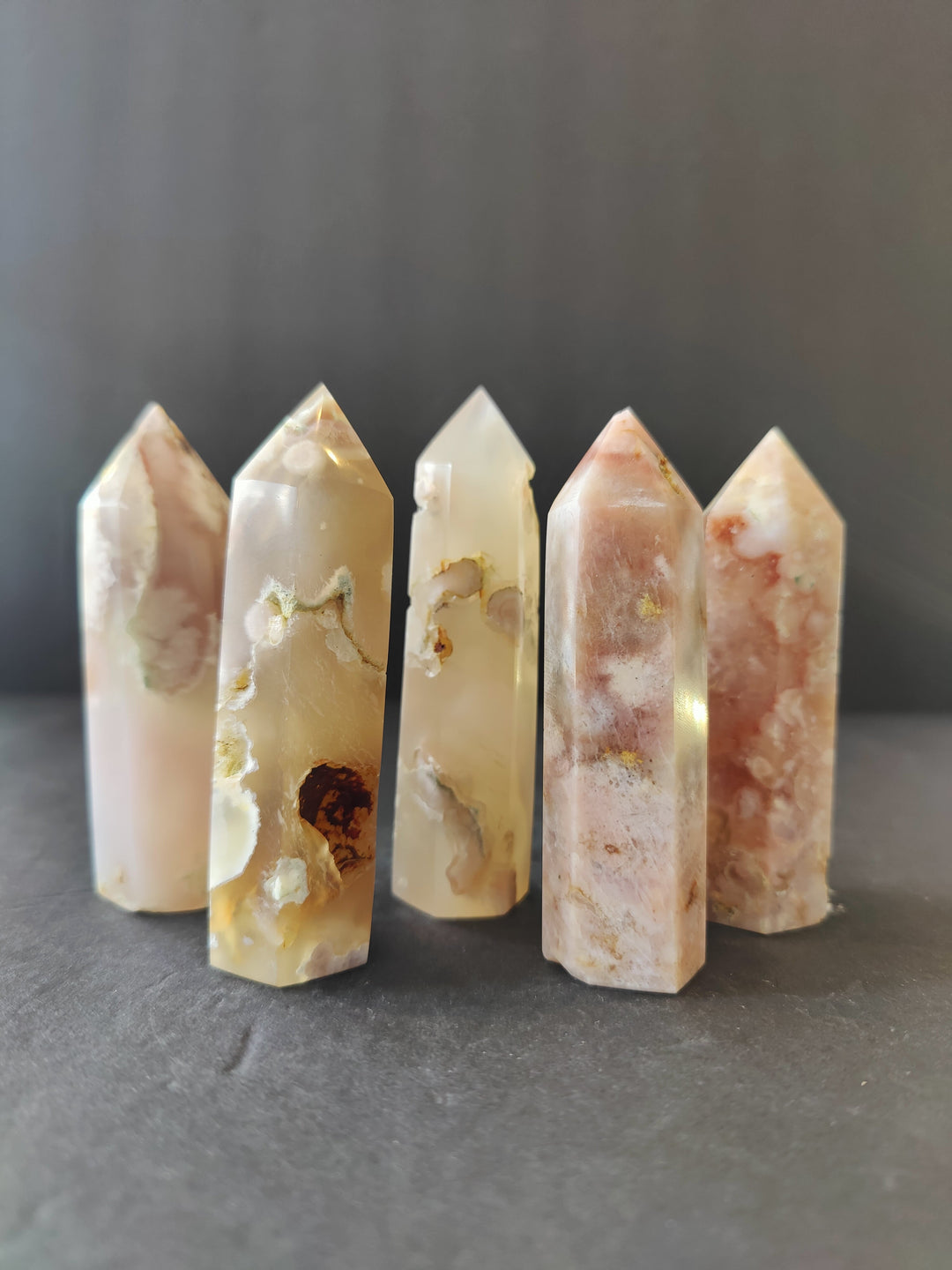 Agate crystal tower set of polished obelisks with peach and cream veining