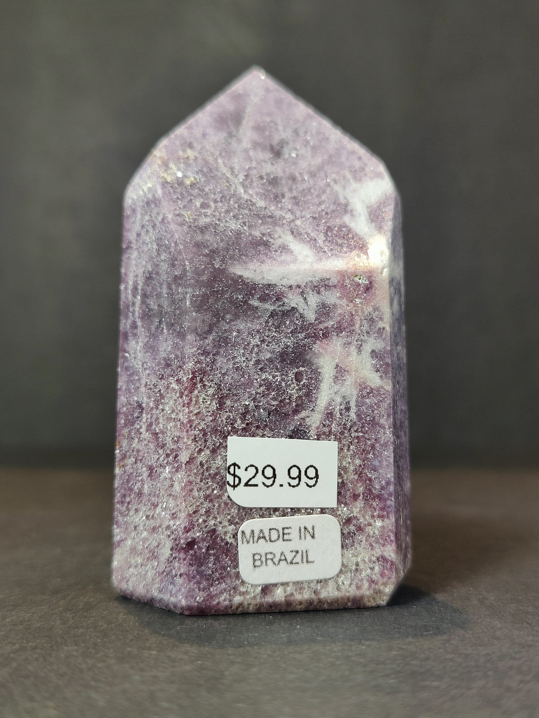 Polished lepidolite tower sculpture, tall purple with white streaks