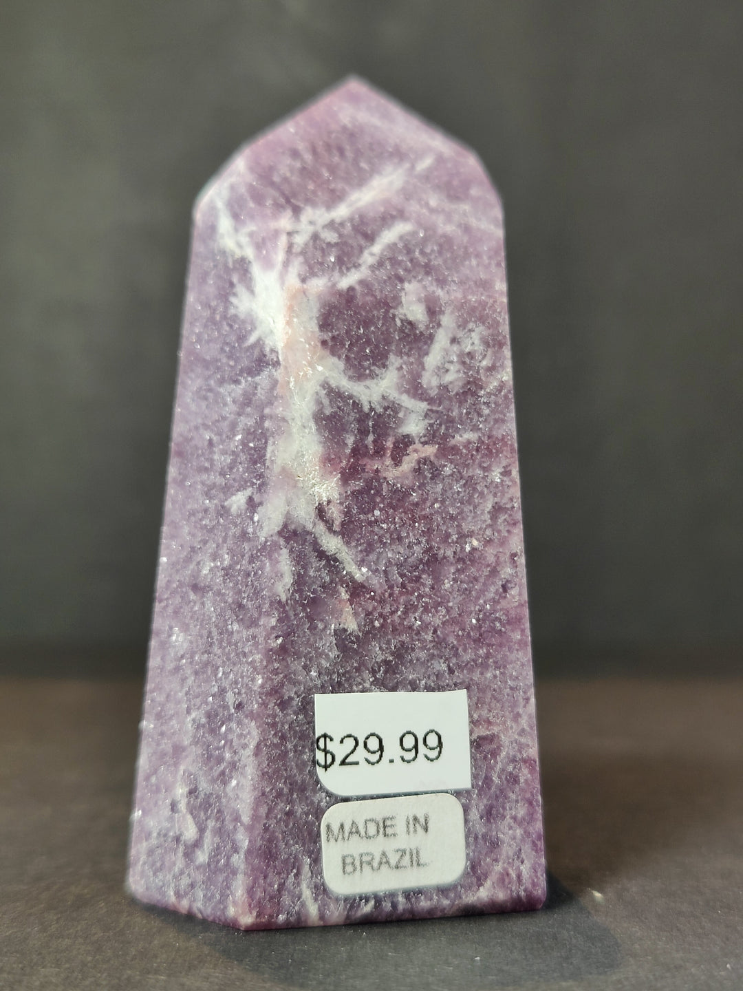 Polished lepidolite tower sculpture, deep purple with light white patterns