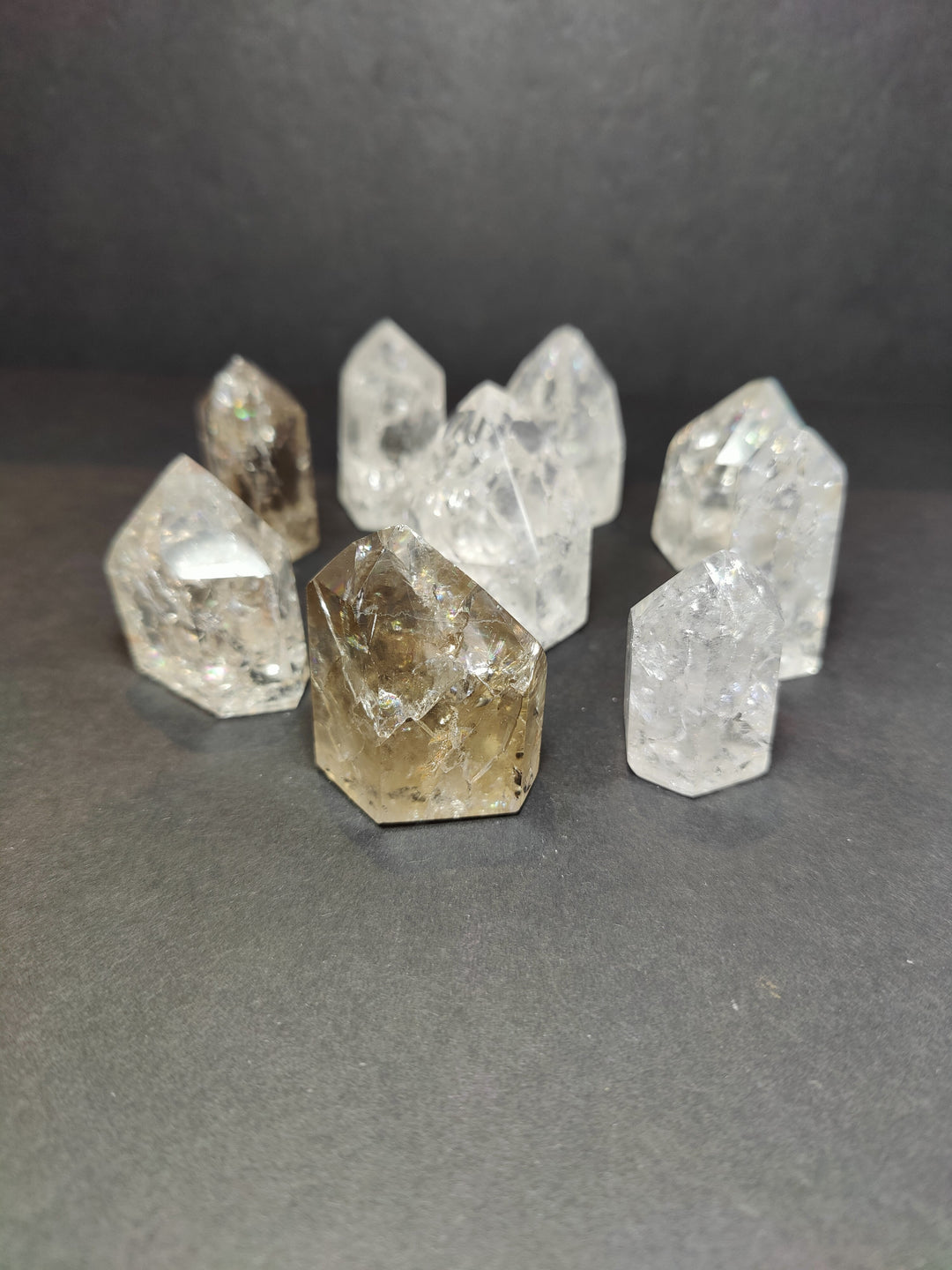 Cluster of five faceted quartz points, clear with one center smoky gold piece