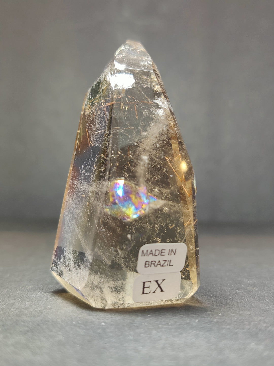 Clear quartz with smoky inclusions free-form crystal; Made in Brazil and EX labels