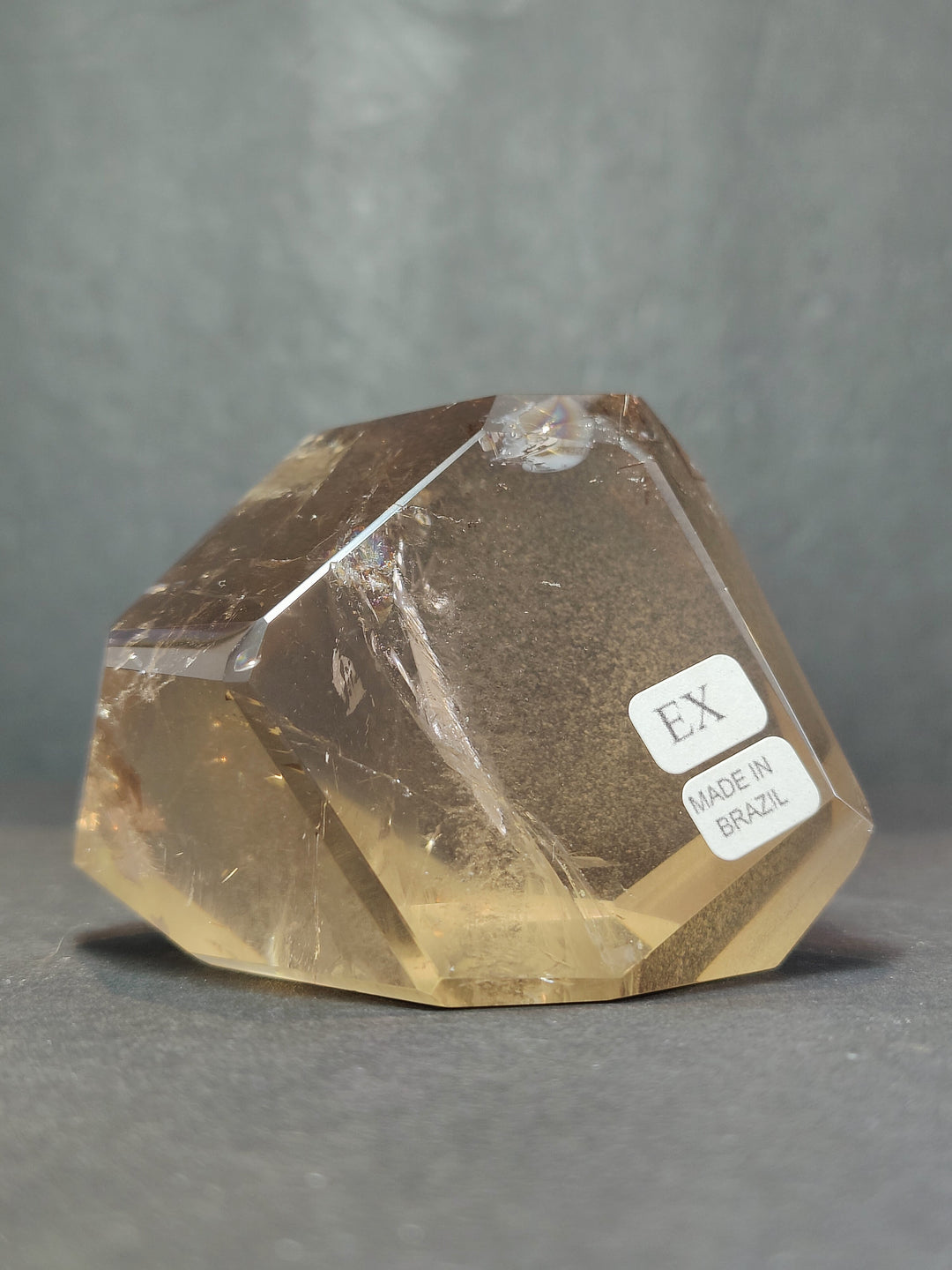 Smoky clear quartz free-form sculpture, polished multi-faceted, label: EX