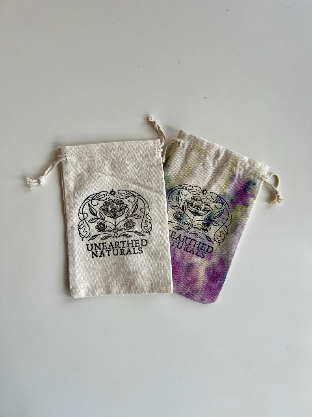 Reusable cotton muslin bath soak bag set: white and purple drawstring bags, UNEARTHED NATURALS