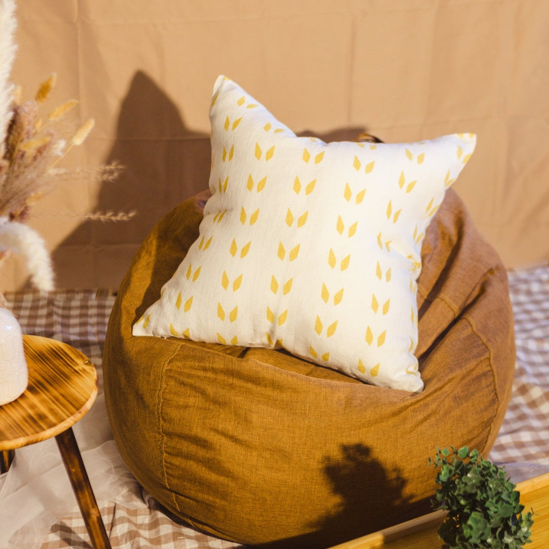 Linen throw pillow cover, white with mustard leaf pattern, square