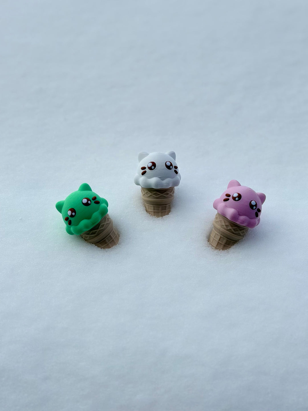 Pink cat ice cream fidget with cute face on beige waffle cone