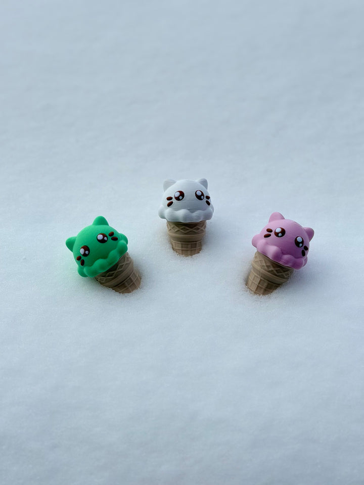 Pink cat ice cream fidget with cute face on beige waffle cone