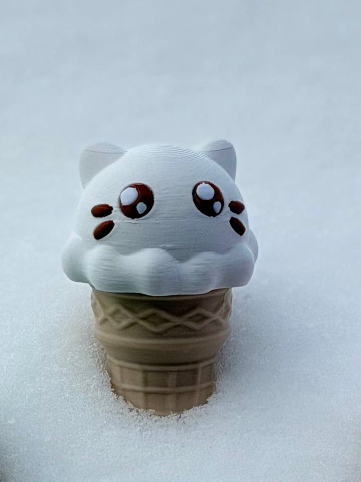 White cat ice cream fidget with big eyes on beige waffle cone