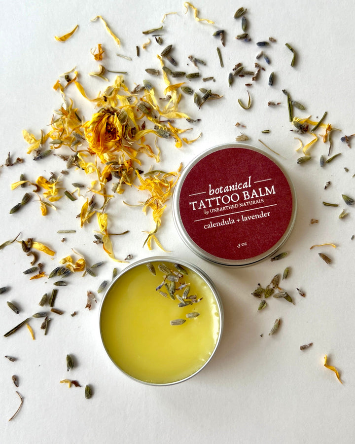 Calendula-lavender and natural calendula balm tins with yellow salve