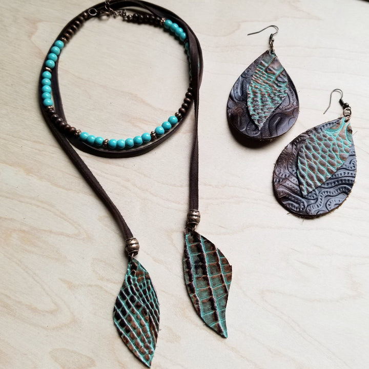 Turquoise bead collar necklace with leaf pendant and matching turquoise earrings.