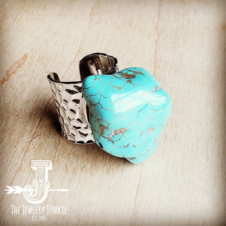 Turquoise chunk cuff ring with hammered silver band and bezel setting